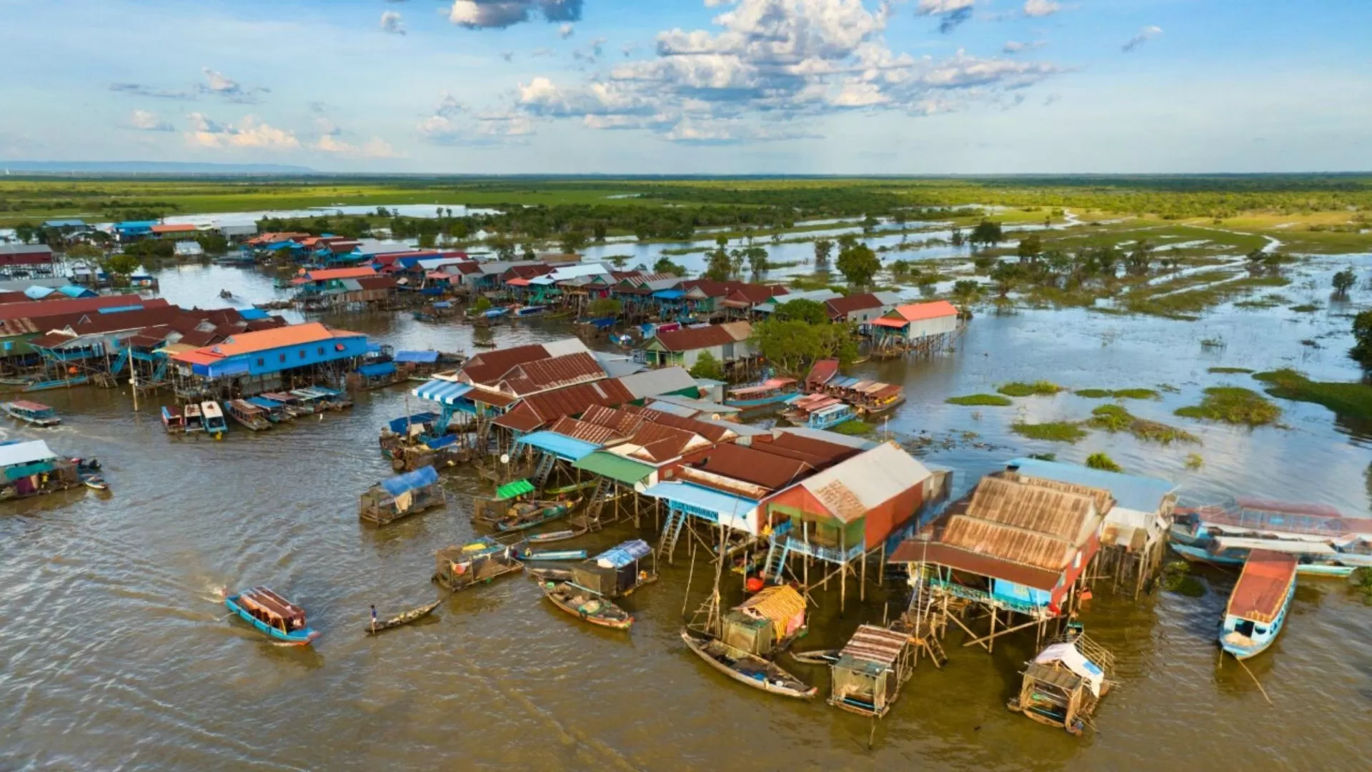 Taking a boat trip to the floating villages of Tonle Sap