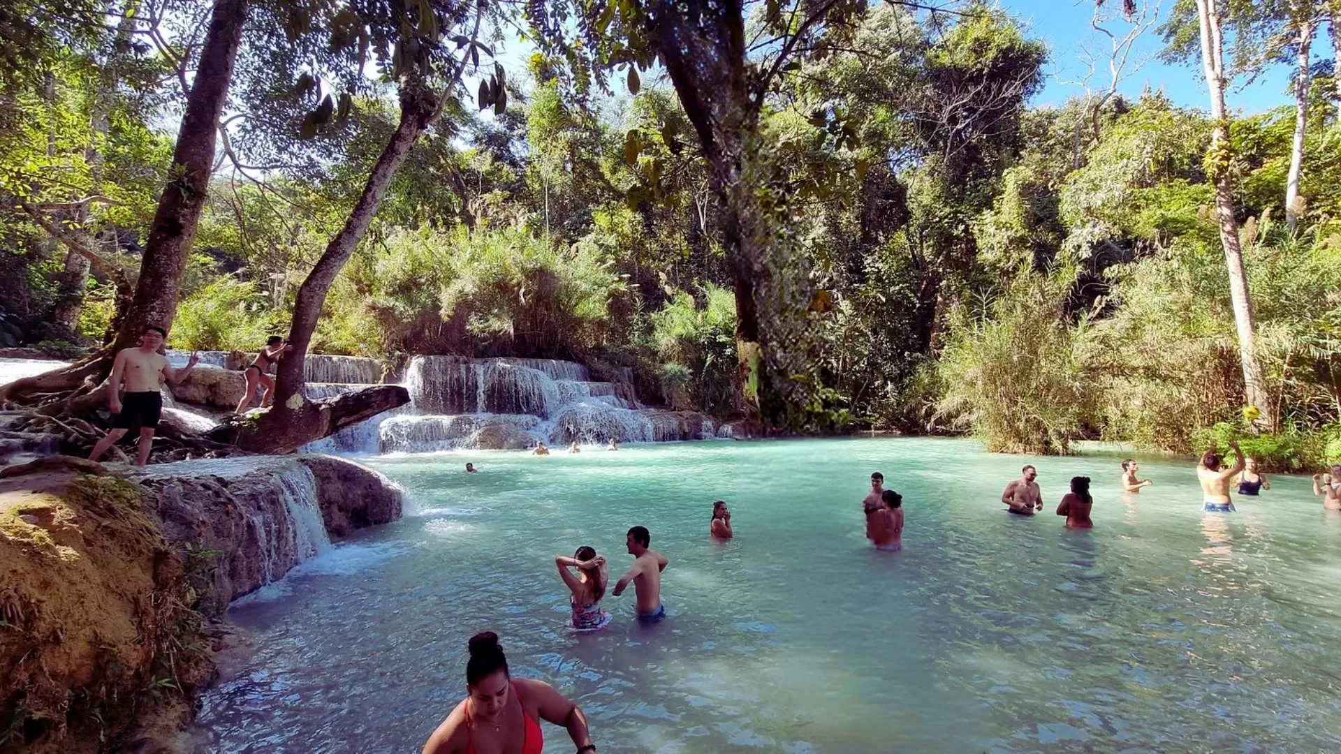 Swim in the turquoise pools of Kuang Si waterfall