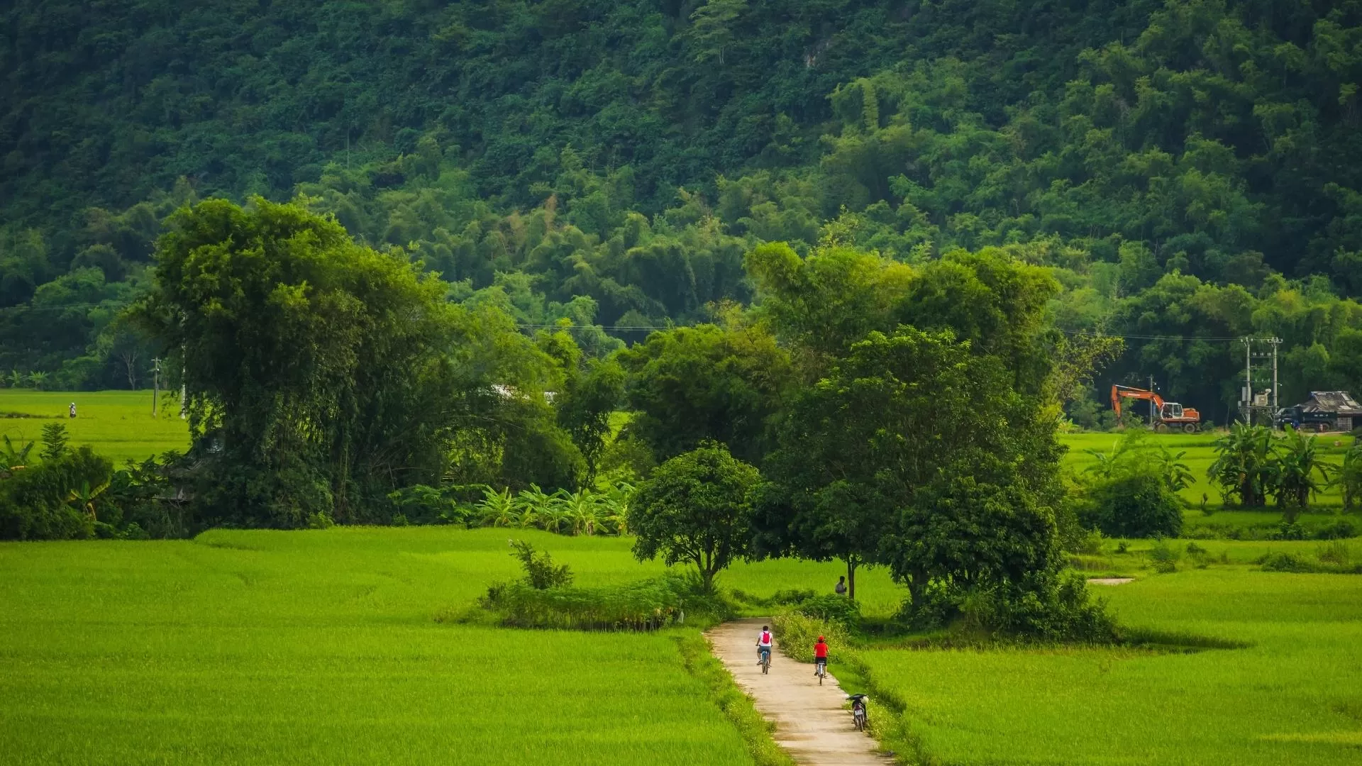 Cycling through the tranquil Lac village