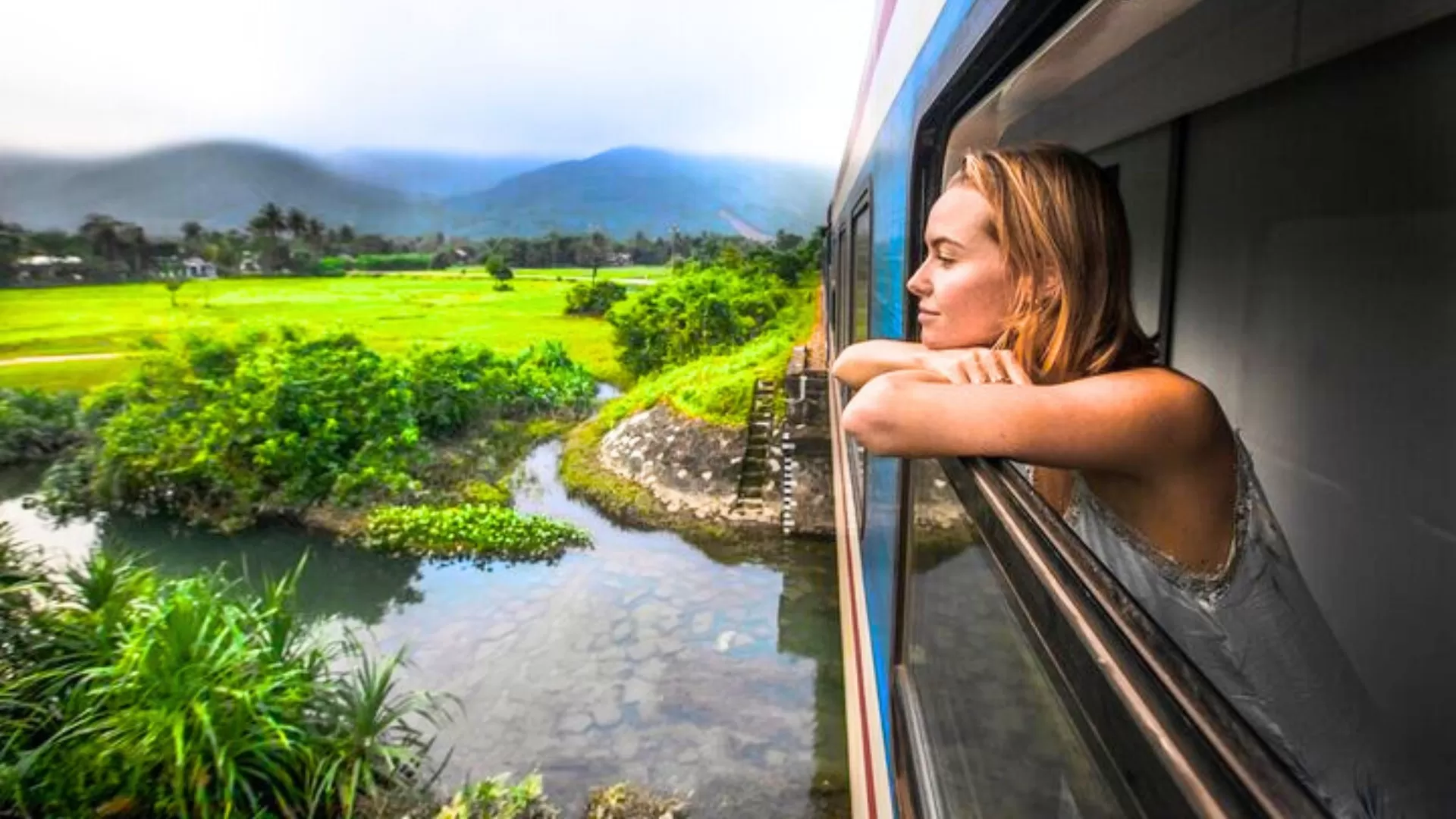 Enjoy the beautiful scenery of Vietnam from the train