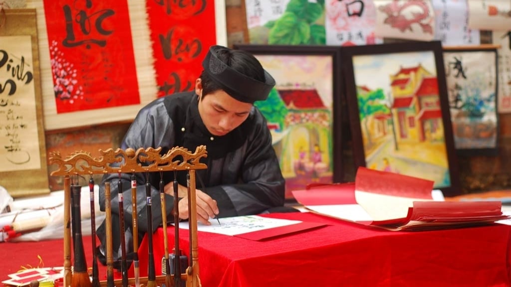 Voyage en famille à Hanoi – Un maitre en calligraphie